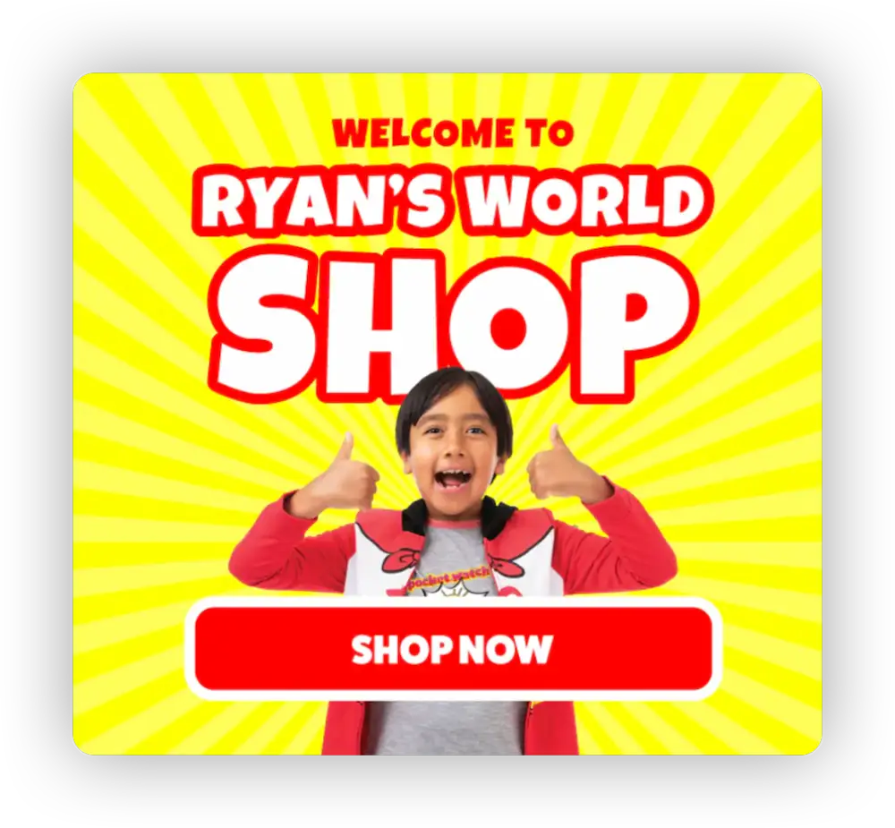 Ryan from Ryan's World giving double thumbs up to Shop Now on his website store front.